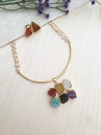 Half-round stone pendant set